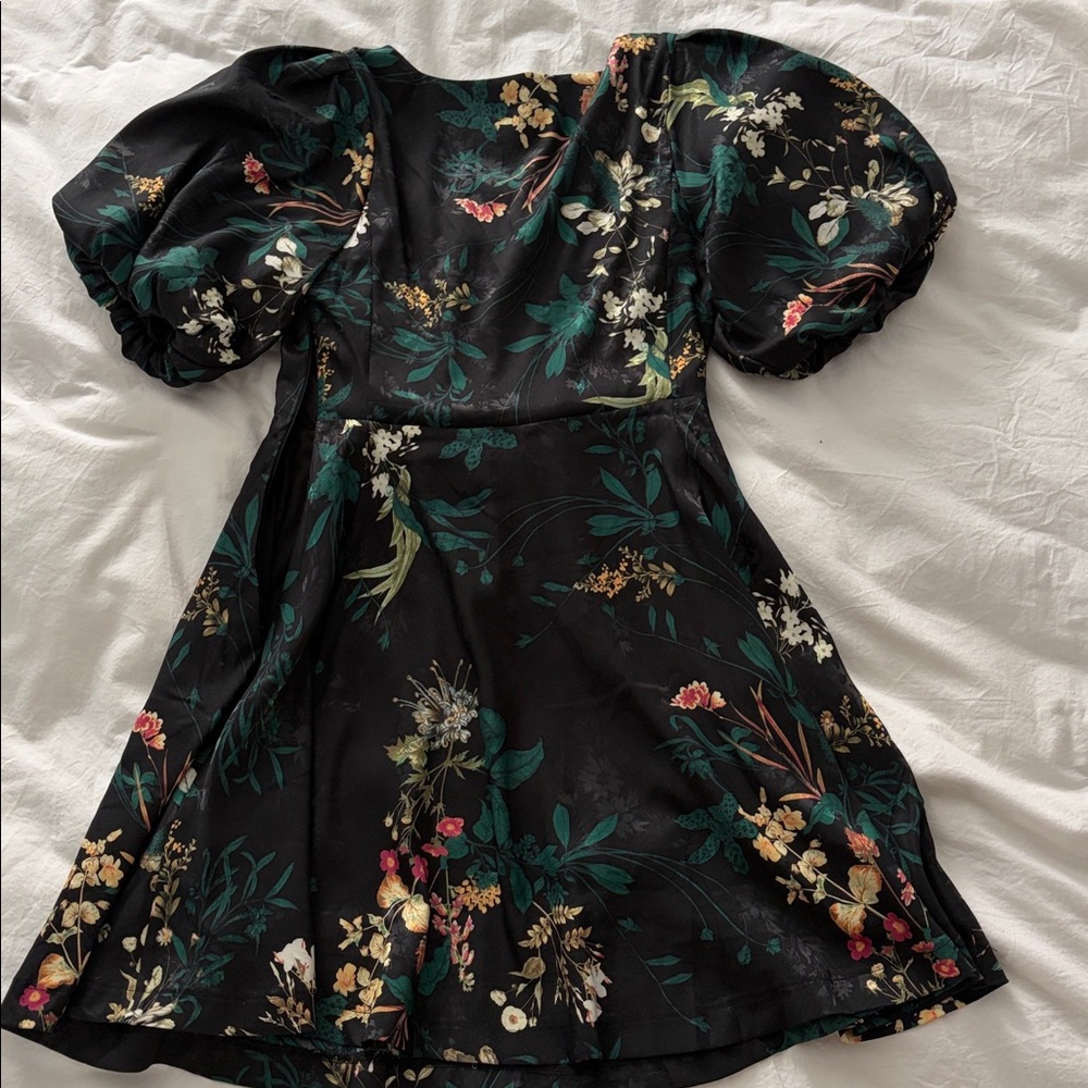 Mini black dress with bubble sleeves and flare skirt - Picture 7 of 9